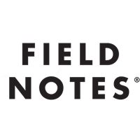 a black and white photo of a field notes logo.