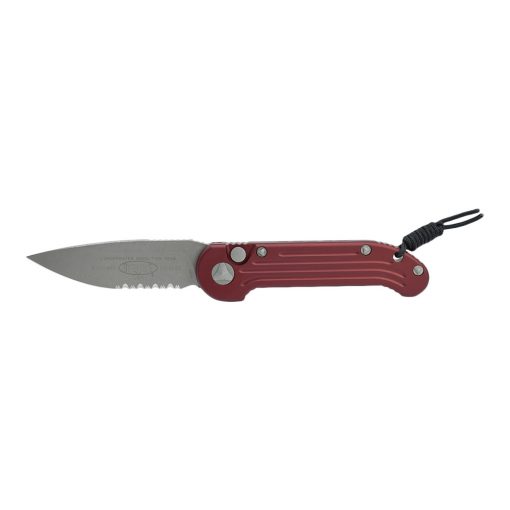 A Microtech LUDT Auto Apocalyptic Drop Point Partially Serrated Blade Red Aluminum Handle with a black handle on a white background.