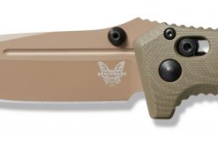 A close up of a Benchmade Mini Adamas Flat Dark Earth Cerakote Cruwear Blade OD Green G-10 Handle on a white background.