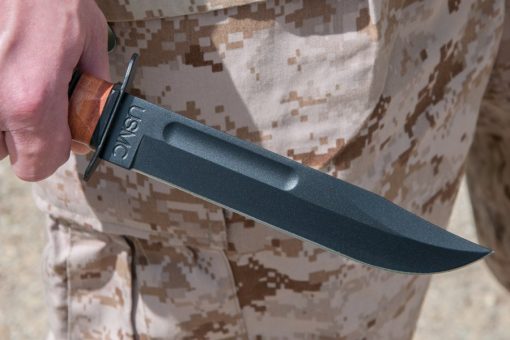 Ka-Bar USMC Fighting Knife 1095 Blade Brown Leather Handle In hand