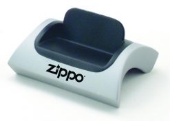 A close up of a small device with the word Zippo on it.