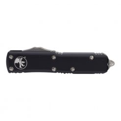 Microtech UTX-85 OTF Automatic Knife D/E Stonewash Fully Serrated Blade Black Aluminum Handle Front Side Closed