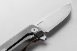 LionSteel Myto Stonewash M390 Drop Point Blade Natural Canvas Handle Flipper Tab Close Up