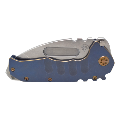 Praetorian T MagnaCut Tumbled Tanto Blue Ano with Bronze Pinstriped Handles Front Side Closed