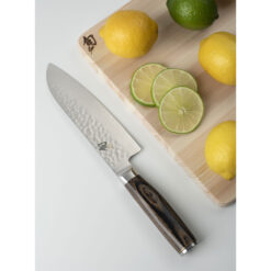 Shun Premier Santoku 7 Inch Damascus VG-MAX Fixed Blade Ebony Pakkawood Handle With Sliced Lemons and Limes