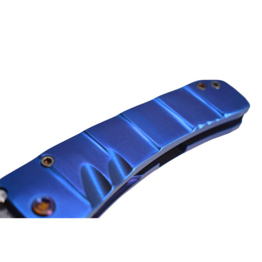 Medford Midi Marauder Tumbled S45VN Tanto Blade with Blue Anodized Armadillo Sculpted Handles with Flamed Hardware and Clip Angled Handle Close Up