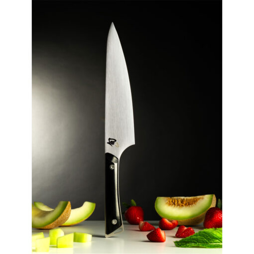 Shun Kazahana 8 Inch Satin Chef's Knife with Polished Black Pakkawood Handle with Various Fruits
